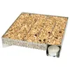 A stainless steel smoker box filled with wood chips and a tea light candle underneath. Produktbild-Vorschau