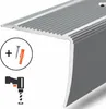 A close-up view of an aluminum stair nosing profile, with icons indicating included screws, wall plugs, and a drill. Podgląd zdjęcia produktu