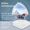 An igloo with a mountain view in the background, and a folded duvet in the foreground. Voir les images du produit