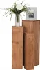 Three wooden pedestals of varying heights, with a vase of white flowers and a framed picture on the tallest pedestal. Produktbild-Vorschau