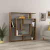 A modern wooden bookshelf filled with books and decorative items, placed in a living room setting next to a sofa. Voir les images du produit