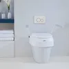 A toilet seat riser with armrests in a bathroom setting. Produktbild-Vorschau