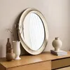 A mirror and decorative vases are displayed on a wooden dresser. Anteprima dell’immagine prodotto