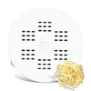A white pasta maker disc with holes and a pile of uncooked linguine pasta next to it. Voir les images du produit