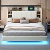 A modern bedroom with a white upholstered bed featuring built-in storage and LED lighting. Produktbild-Vorschau