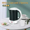 A travel kettle with cups and spoons on a table, with promotional text overlay. Produktbild-Vorschau