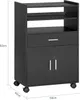 A black kitchen cabinet with wheels, a drawer, and two doors, shown with dimensions indicated. Anteprima dell’immagine prodotto