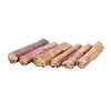 Several dried dog chews arranged in a row on a white background. Náhľad obrázku produktu