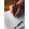 A hand holding a mechanical pencil and drawing on graph paper, with a spare lead cartridge nearby. Anteprima dell’immagine prodotto