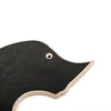 A close-up view of a black, hexagon-patterned product with a wooden edge, against a white background. Produktbild-Vorschau