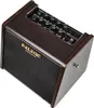 A Nux AC-25 portable acoustic guitar amplifier is shown from a slightly elevated angle against a white background. Podgląd zdjęcia produktu