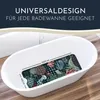 A bath mat with a marine life pattern is placed inside a white bathtub, with dimensions indicated. Produktbild-Vorschau