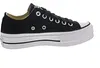 A side view of a black Converse Chuck Taylor All Star Lift Ox sneaker with a white platform sole. Voir les images du produit