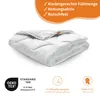A folded white duvet is shown on a white background, with marketing text and logos around it. Náhled obrázku produktu