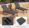 Two grey lounge chairs on a patio with a stone wall and purple flowers in the background. Insets show close-ups of the chair's fastening straps and a folded cushion. Anteprima dell’immagine prodotto