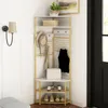 A corner coat rack with shelves and hooks, displaying hats, bags, and shoes. Podgląd zdjęcia produktu