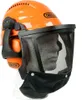 A professional product shot of a chainsaw safety helmet with attached ear protection and face shield, displayed on a mannequin head against a white background. Produktbild-Vorschau