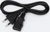 A black power cord with two different types of plugs on a white background. Produktbild-Vorschau