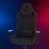 A black gaming chair with a blue and red gradient background. Produktbild-Vorschau