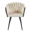A beige armchair with a braided design and black legs, shown from the front on a white background. Produktbild-Vorschau