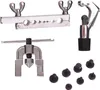 A set of automotive tools for flaring brake lines, including a flaring tool, a pipe cutter, and various adapters, displayed against a white background. Anteprima dell’immagine prodotto
