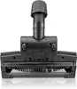 A close-up, studio shot of a black vacuum cleaner attachment, specifically a turbobrush nozzle, is presented against a white background. The attachment features a rotating brush at the bottom and a connector at the top with a textured knob. Produktbild-Vorschau