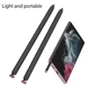 Two black styluses and a pink smartphone are displayed on a white background. Anteprima dell’immagine prodotto