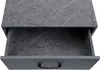 An open drawer of a nightstand with a marble-like finish. Produktbild-Vorschau