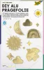 A flat lay of gold foil embossing shapes including a sun, moon, clouds, rainbow, and bird, on a white and colored background. Náhľad obrázku produktu