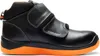 A black work boot with orange sole and black velcro straps. Produktbild-Vorschau