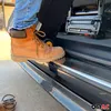 A person's foot wearing a brown boot is stepping onto the edge of a vehicle, likely a van or SUV. The vehicle has a black, textured trim with a silver accent strip. The background shows part of a car seat and a wheel. Produktbild-Vorschau