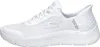 A side view of a single white sneaker. Voir les images du produit