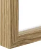 A close-up view of the corner of a wooden picture frame. Produktbild-Vorschau