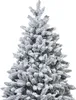 A close-up view of the top portion of a flocked artificial Christmas tree. Podgląd zdjęcia produktu