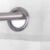 A close-up view of a grommet on a white sheer curtain. Anteprima dell’immagine prodotto