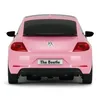 The rear view of a pink Volkswagen Beetle toy car. Náhled obrázku produktu