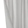 A close-up view of a white or light gray curtain, showing its texture and folds. Produktbild-Vorschau