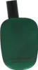 A green bottle of perfume with a black cap. Podgląd zdjęcia produktu