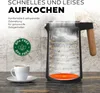 A cutaway illustration of a black electric kettle with a wooden handle, showing the heating element and water boiling inside. A cup of coffee sits on a saucer to the left. Text overlays highlight "Fast and quiet boiling" and "BPA FREE". Voir les images du produit