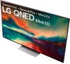 A television screen displaying a colorful abstract image, with text overlays promoting LG QNED MiniLED technology. Produktbild-Vorschau