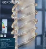 A coiled rope light is shown on a vertical surface, with packaging details visible on the left. Produktbild-Vorschau