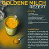 A glass of golden milk with turmeric powder scattered around it, next to a recipe for golden milk. Produktbild-Vorschau