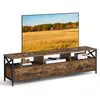 A rustic-style TV stand with a large television on top, featuring drawers and shelves. The stand is made of wood-like material with black metal accents. Náhled obrázku produktu