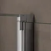 A close-up view of a shower door hinge and frame. Produktbild-Vorschau