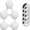 A set of interconnected smoke detectors arranged in a network formation, with a stack of adhesive mounting pads to the right. Produktbild-Vorschau
