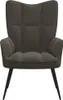 A studio shot of a gray velvet armchair with black legs. Voir les images du produit