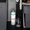 Under a sink, showing cleaning products and plumbing. Anteprima dell’immagine prodotto