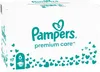 A white cardboard box with the Pampers Premium Care logo and branding, decorated with small teal hearts. Podgląd zdjęcia produktu