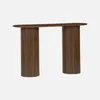 A wooden console table with an oval top and two cylindrical, fluted legs, presented against a plain white background. Produktbild-Vorschau