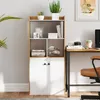 A bookshelf with two doors at the bottom, placed in a home office setting next to a desk. Produktbild-Vorschau